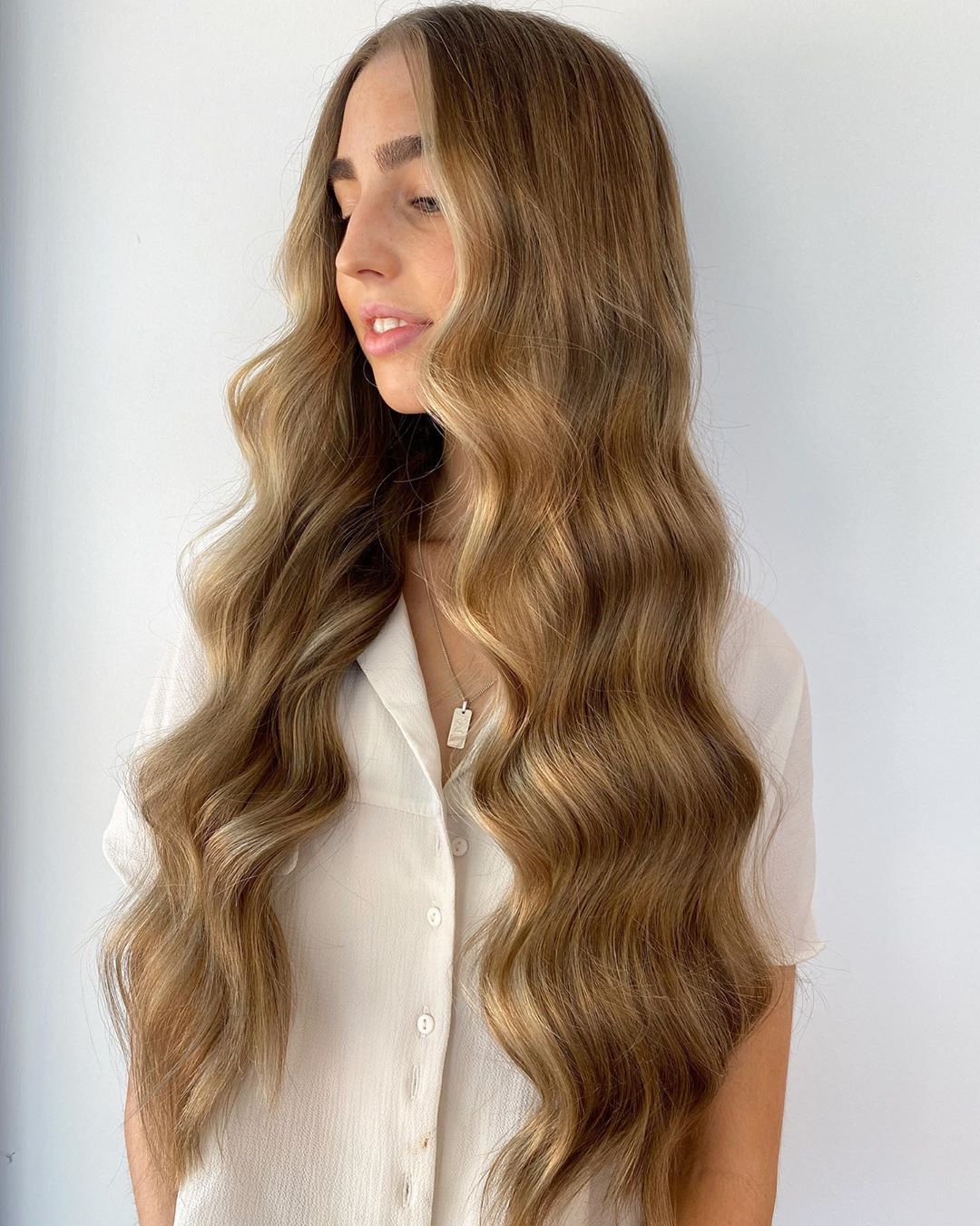 cabelo de caramelo dourado com pedaços de dinheiro